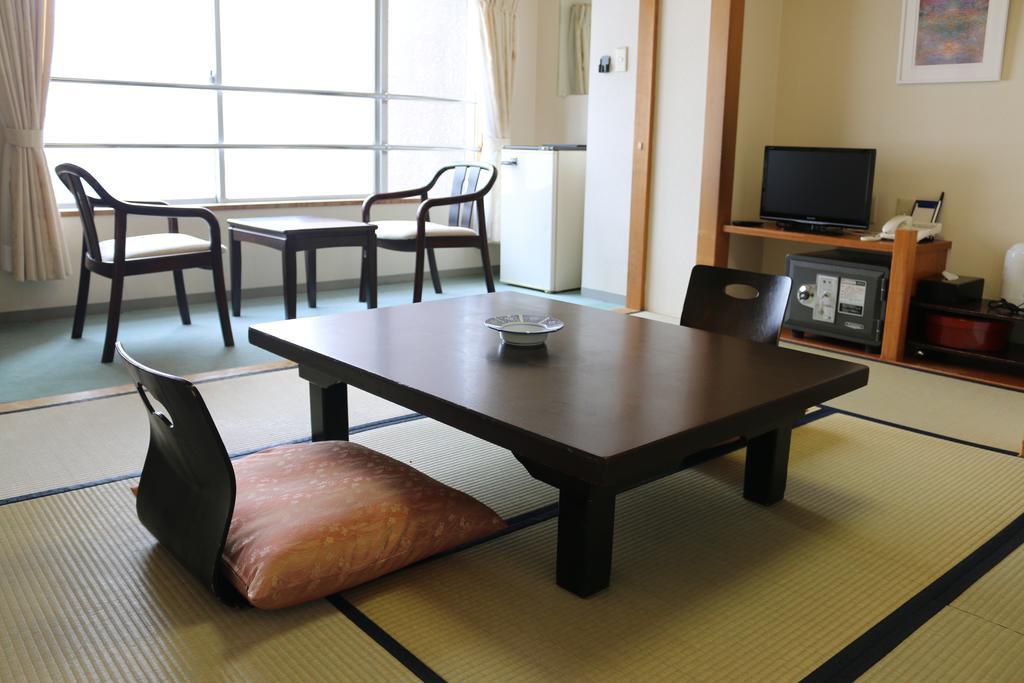 Hotel Sankeien Sapporo Kamer foto